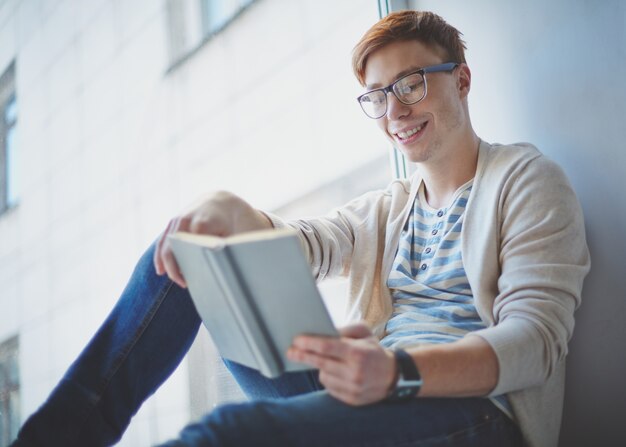 Student reading a book