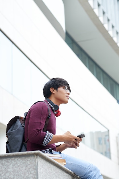 Student resting outdoors