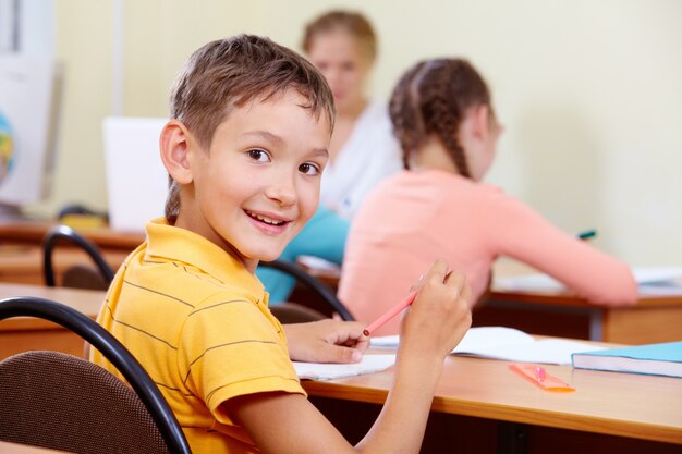 Student with pencil and ruler