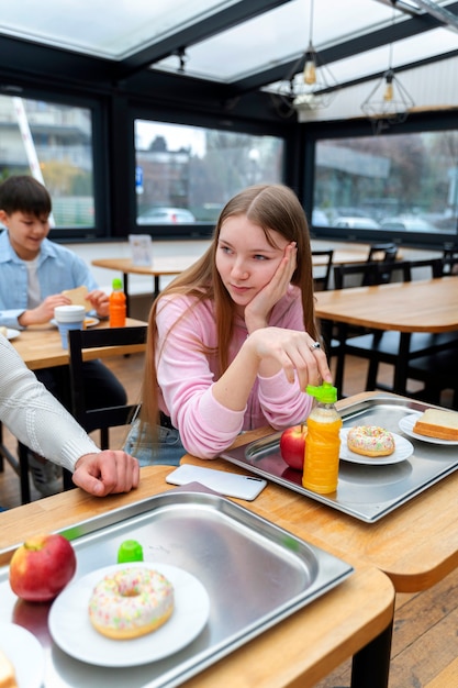 Students having lunch in the canteen