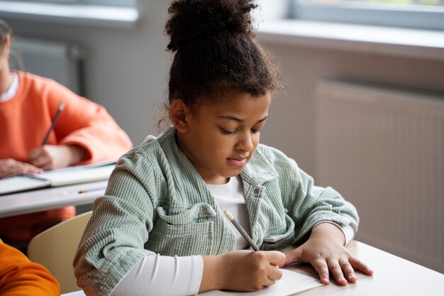 Students learning at school in their classroom