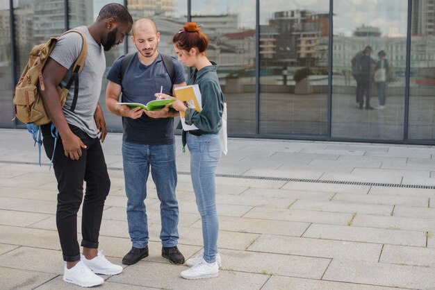 Students standing outside talking