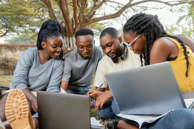 Students studying together medium shot