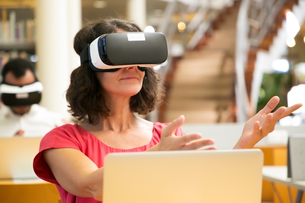 Students using VR gadgets for studying