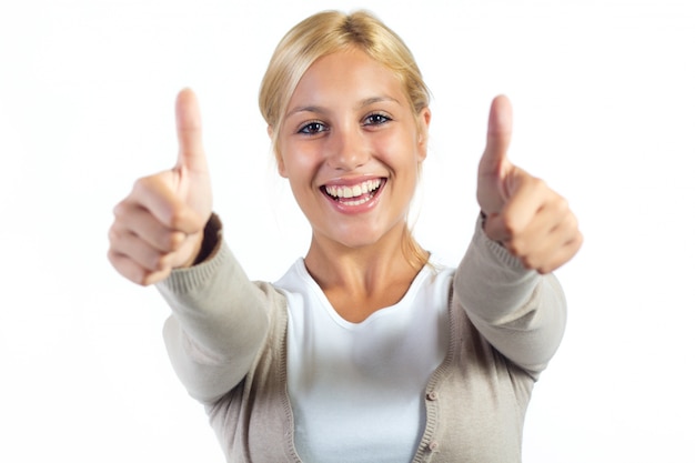 Free photo studio portrait of beautiful young woman posing with white screen