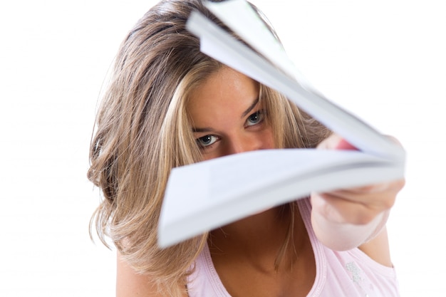 Free photo studio portrait of  of beautiful young woman reading