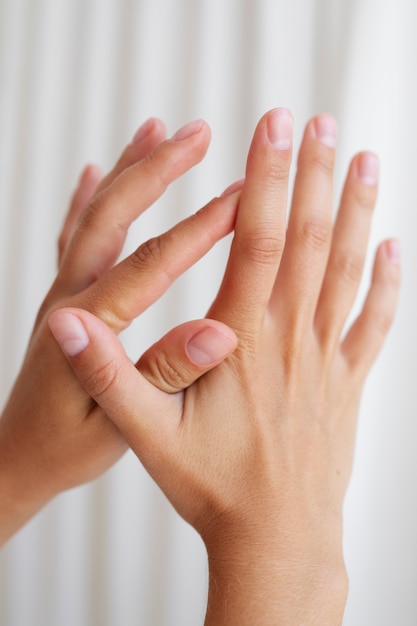 Free photo studio portrait with hands holding each other