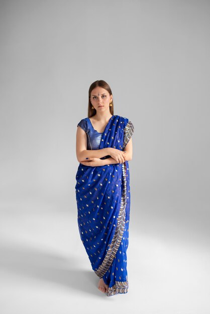 Studio portrait of young woman wearing a traditional sari garment