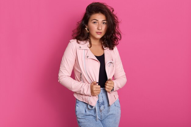 Studio shot of attractive stylish woman posing