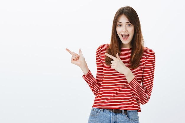 Studio shot of a brunette girl in casual outfit