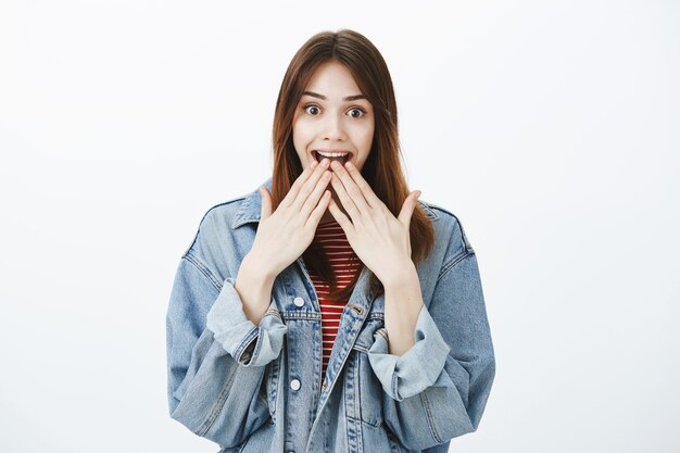 Studio shot of a brunette girl in casual outfit