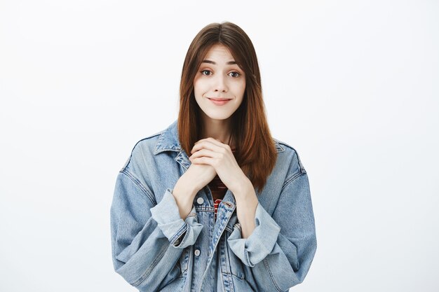 Studio shot of a brunette girl in casual outfit