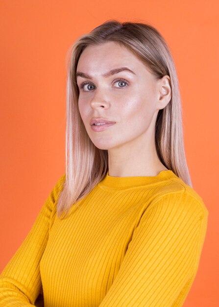 Studio shot of confident blonde woman