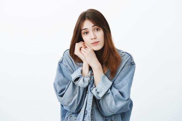 Studio shot of cute brunette girl