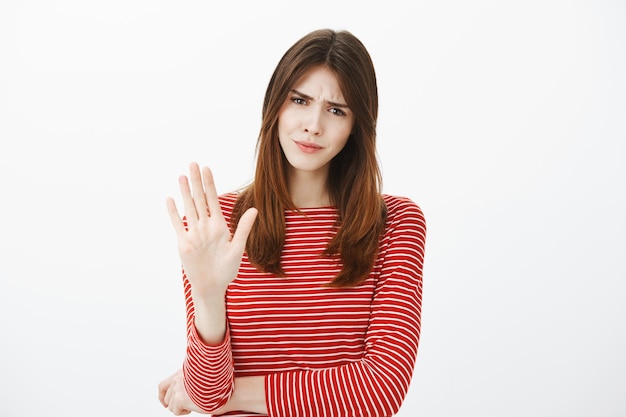 Studio shot of cute brunette girl