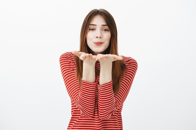 Studio shot of cute brunette girl