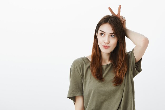 Studio shot of cute brunette girl