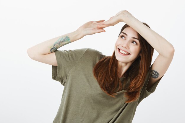 Studio shot of cute brunette girl