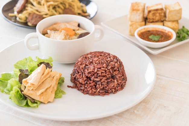 Stuffed cabbage soup with berry rice and tofu