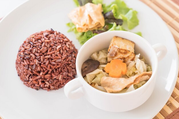 Stuffed cabbage soup with berry rice and tofu