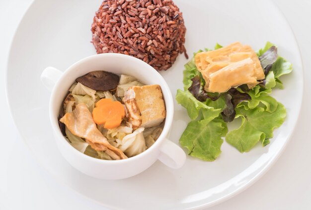 Stuffed cabbage soup with berry rice and tofu