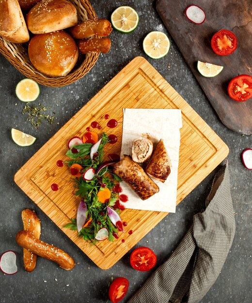 Stuffed chicken roll with vegetables