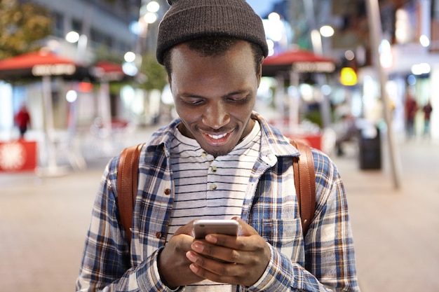 Free photo stylish african-american man on street