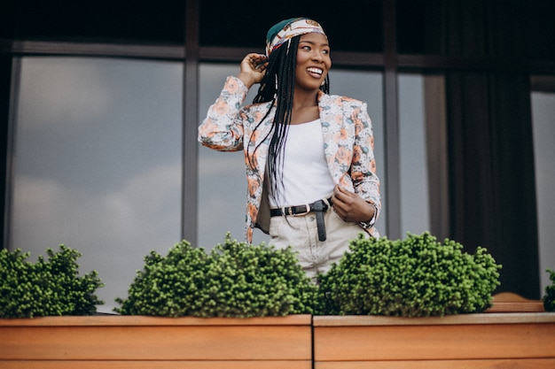 Stylish african american woman by the cafe