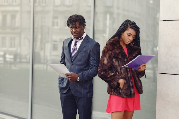 Free photo stylish black couple have business conversation