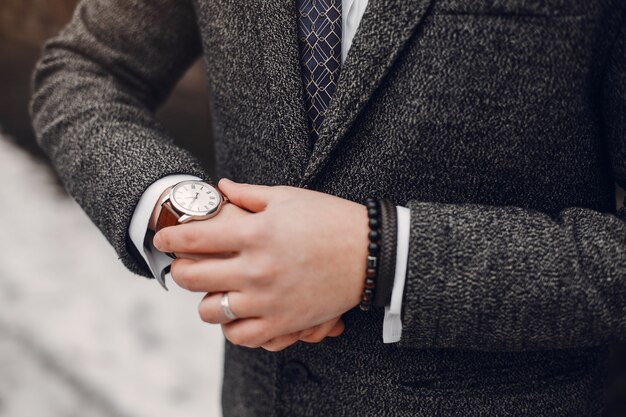 Stylish businessman working in a city