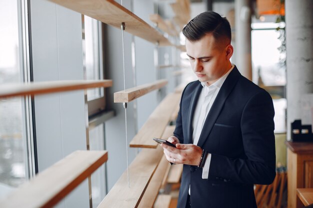 Stylish businessman working in a office