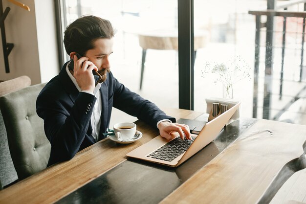 Stylish businessman working in a office