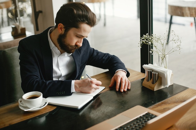 Stylish businessman working in a office