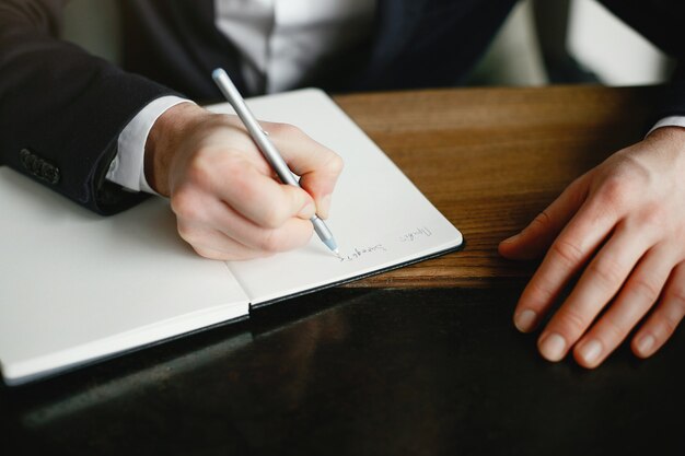 Stylish businessman working in a office