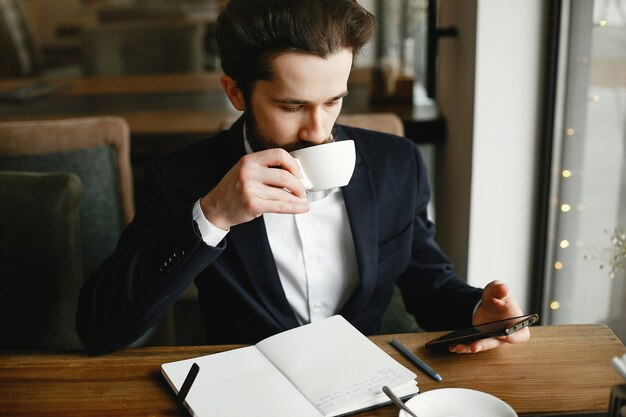 Stylish businessman working in a office