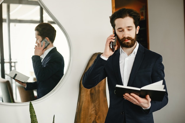 Stylish businessman working in a office