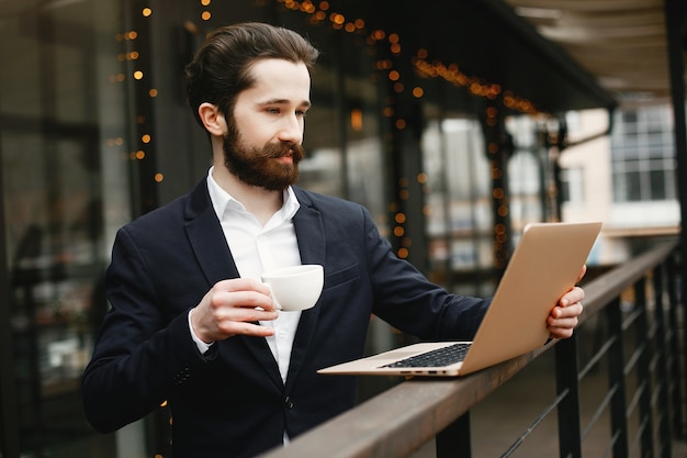 Stylish businessman working in a office