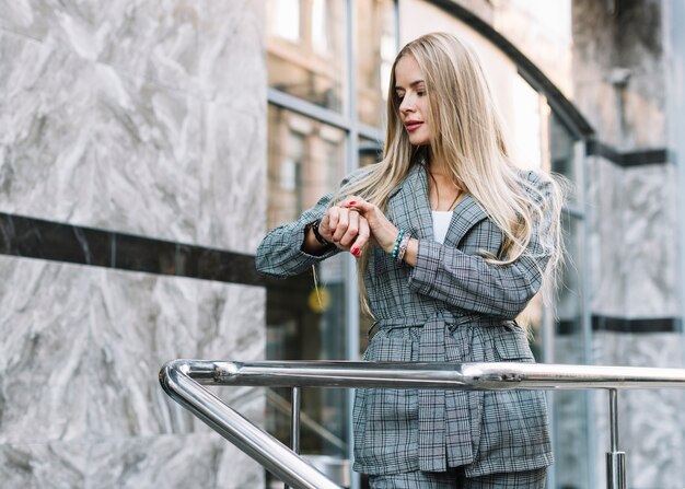 Stylish businesswoman in city environment