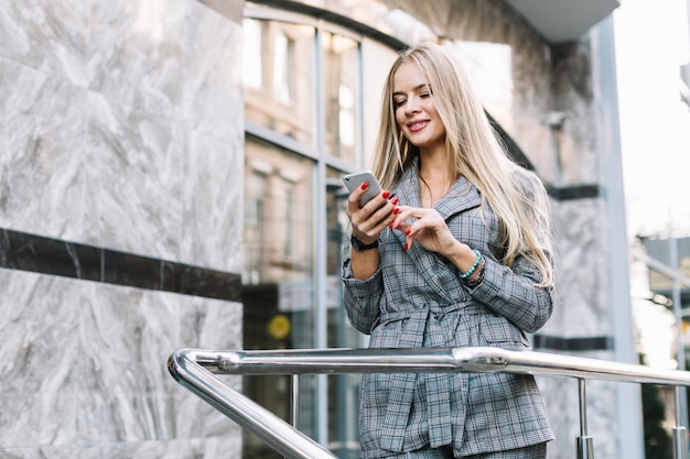 Stylish businesswoman in city environment