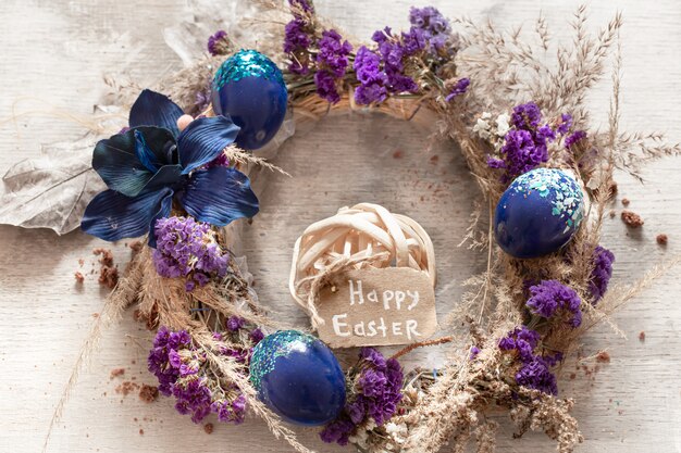 A stylish composition with the Easter wreath and eggs