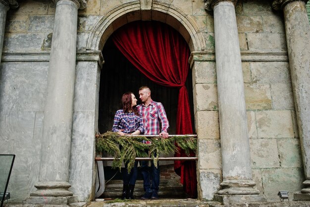 Stylish couple wear on checkered shirt in love together