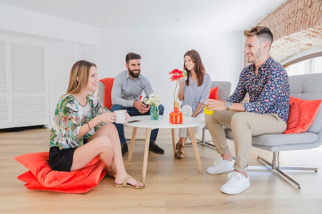 Stylish coworkers having coffee break