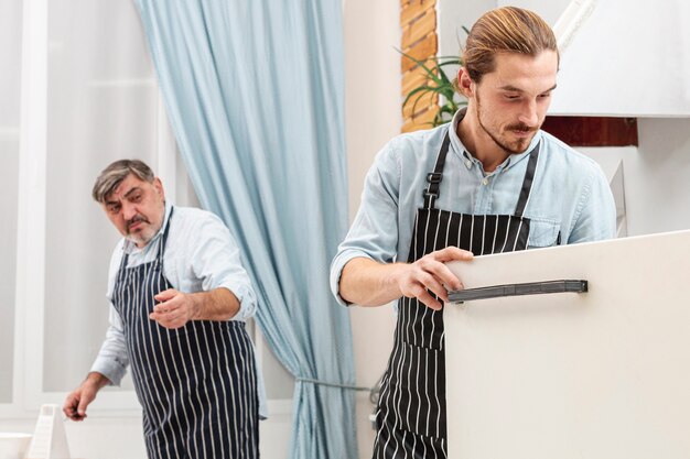 Stylish father and son cooking