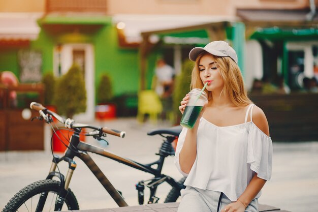 stylish girl with bicycle