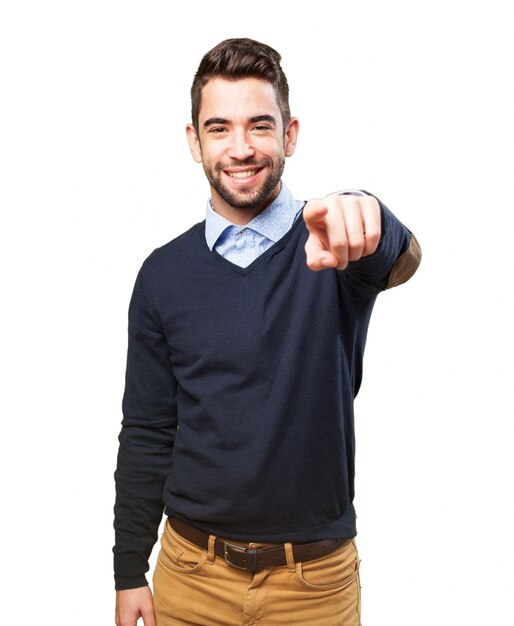 Stylish guy pointing with his left hand