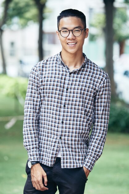 Stylish guy posing outdoors