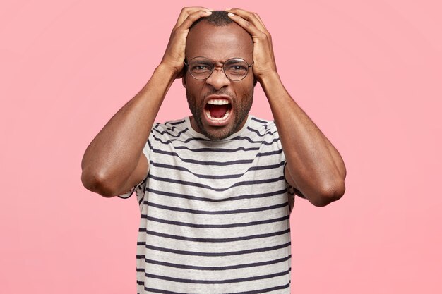 Stylish guy wearing round glasses