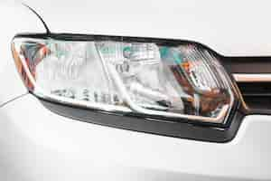 Free photo stylish headlight of silver automobile