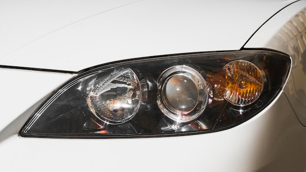 Stylish headlight of white auto