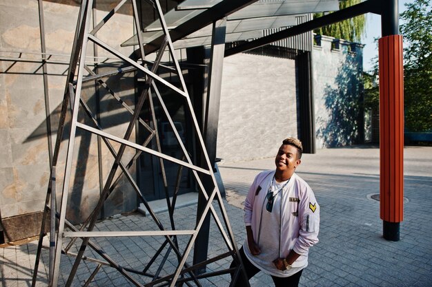 Stylish hipster arab man guy posed outdoor in street Style rap singer